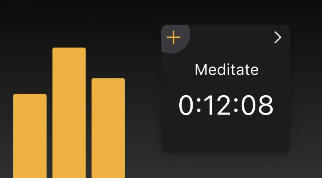UpTrack habit charts beside a meditation timer